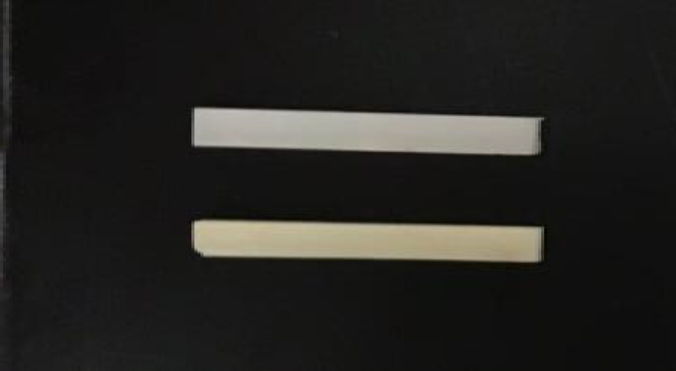 Composite resin containing 0% N-TiO2 (top) and 1% N-TiO2 (bottom).